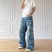 Men's Vintage American Workwear Jeans – Distressed Light Wash With Multi-Pocket Design, Loose Fit & Raw Hem Detail_mkmklike.com
