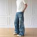 Men's Vintage American Workwear Jeans – Distressed Light Wash With Multi-Pocket Design, Loose Fit & Raw Hem Detail_mkmklike.com