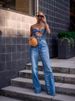 Women's High-Waisted Button-Fly Jeans – Raw Hem Distressed Denim Pants, Loose Fit Streetwear Style (Blue, S-4XL)_mkmklike.com