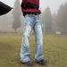 Niche Graffiti Studded Straight Leg Jeans Loose Fit High End Feel Wide Leg Drape Casual Pants For Men And Women_mkmklike.com