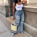 Women's Light Wash Ripped Jeans Loose Fit Straight Leg Casual Wide Leg Pants Cotton Spring/Autumn_mkmklike.com