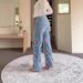 Designer Embroidered Jeans For Women – Distressed Denim Pants With Floral Cutouts & Rhinestone Details (Blue, Straight-Leg Fit)_mkmklike.com