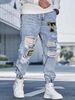 Distressed Artisan Jeans For Men – Slim Fit Ripped Denim With Hand-Embroidered Details (Light Blue, S-XXL)_mkmklike.com