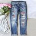 Women's Ripped Jeans Style Button Pocket Detail Flag Design Printed Trousers_mkmklike.com