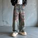 Men's Clothing Trendy Men's Loose Fitting Straight Leg Jeans Graffiti Details Blue Washed Faux Ripped American Style_mkmklike.com