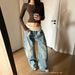 Women's Vintage Distressed Washed Deconstructed Jeans mid Rise Ribbed Waist Visible Stitching Pleats Wide Leg Silhouette_mkmklike.com