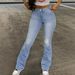 Women's High-Waisted Distressed Flare Jeans – Vintage Light Blue Denim, Boho Streetwear (Ripped Knee, Retro Bell Bottoms, Comfort Fit)_mkmklike.com