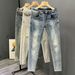 New Washed Blue Ripped Jeans Men's Autumn Personalized Scratched Slim-fitting Small Feet High Versatile Trousers_mkmklike.com