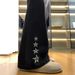 "Men's Black Embroidered Star Flare Jeans – Retro High-Street Vibe, Stretch Denim, Distressed Hem (90s Hip-Hop Inspired)"_mkmklike.com