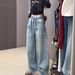 Women's Vintage Star-Embossed Flare Jeans – High-Waisted Wide-Leg Denim Pants With Rhinestone Detailing (Blue, Sizes S-XL)_mkmklike.com