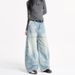LKTM Vintage Wide-Leg Distressed Denim Jeans Asymmetrical Hem Patchwork Detail Retro American Style for Men And Women_mkmklike.com