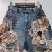 2025 Summer New Niche Lace Flower Stitching Drawing Hole Rhinestone Back Elastic Waist Trendy Cool Denim Shorts_mkmklike.com