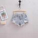 High Count Ripped And Fringed Denim Shorts for Women Trendy Hot Pants Summer Fashion Must-Have Stylish A-Line Mini Skirt for Bloggers_mkmklike.com