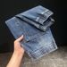 Fattened Plus-size Patch Jeans Men's Trendy Brand Elastic Waist Splicing Model Tied Feet Foreign Trade Denim Nine-point Pants Men_mkmklike.com