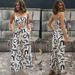 Women's clothing new printed sleeveless suspender short top + long wide leg pants_mkmklike.com