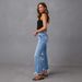 2026 New Ripped Tassel Denim Women's Street High Waist Straight Wide Leg Trousers Summer Jeans Women_mkmklike.com