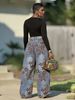 Women's Retro Floral Flocked Curved Blade Jeans New Washed Denim Independent Store_mkmklike.com