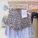 Leopard Print High-Waisted Denim Shorts for Women Summer 2026 European American Style Irregular Ripped And Frayed Wide Leg Hot Pants_mkmklike.com