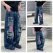 Men's High-Street Jeans – Oversized Straight-Leg Denim Pants With Leather Cross Embroidery & Hand-Painted Details – Vintage Low-Rise Wide-Leg Trousers_mkmklike.com