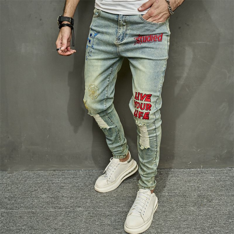 New Autumn Men's Jeans Casual Perforated Letter Slim Fit Small Foot Elastic Pants_mkmklike.com
