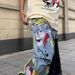 "Streetwear Embroidered Denim Jeans – Oversized Hip-Hop Style For Men & Women"_mkmklike.com