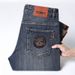 Pulse 2025 Autumn Winter New High-End Light European Style Little Bee Jeans Men's Slim Fit Trendy Skinny Casual Pants_mkmklike.com