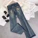 "American Retro Low-Rise Flared Jeans For Women – Vintage Distressed Denim, Embroidered High Street Style, Slim Fit & Floor-Length"_mkmklike.com