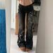 Women's Sexy Washed Black Denim Jeans Low Rise Flared Cowboy Style Floral Embroidery American Street Western Trend_mkmklike.com
