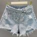 Women's Denim Shorts 2026 Summer New European Style Loose Slimming Ripped Rhinestone Tassel A-line Wide-leg Hot Pants_mkmklike.com