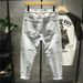 Internet Celebrity Washed Ripped Hole Trend Men's Rugged And Handsome Loose Oversized Straight Tube Thin Nine Inch Denim_mkmklike.com