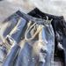 Men's Denim Shorts Ripped And Stylish Trendy Summer Inspired Splatter Paint Design_mkmklike.com
