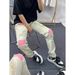 American High Street Amy New Jeans Men's Versatile Ripped Pink Patch Slim Straight Casual Long Pants_mkmklike.com