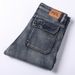 Four Season Versatile Patchwork Multi Pocket Retro Jeans For Men, Loose Straight Leg Outdoor Hiking Military Denim Pants, 50-135KG Wearable_mkmklike.com