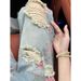 "Men's Streetwear Floral Distressed Jeans – Loose Straight Cut & Edgy Ripped Details (Bold Style, Summer Ready)"_mkmklike.com