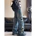 Vintage Distressed Denim Jeans For Men - Retro Washed Blue Relaxed Fit With Faux Rips & Patch Details_mkmklike.com