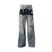 Men's Clothing Street Retro Ripped Jeans Trendy Brand Design New Loose Letter Print Straight Trousers_mkmklike.com