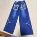 Vintage Blue Star-Patch Jeans – Distressed Flared Denim With Fringe Hem_mkmklike.com