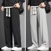 Casual Sports Long Pants Male Garment Men Casual Pants Solid Color Drawstring Elastic Waist Loose Fit Long Trousers_mkmklike.com