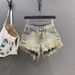 2026 New Retro Old Ripped Holes Heavy Industry Fringed Rough Edge A-word Super Shorts Spice Girl Hip-wrapped Single-breasted Denim Shorts_mkmklike.com