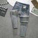 Men's Distressed Slim Fit Jeans With Paint Splatter & Patchwork Detail - Vintage Blue Denim Pants For Casual Streetwear_mkmklike.com