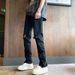 Black Ripped Jeans for Men High Street Style Slimming Straight Leg Loose Fit Zipper American Streetwear Vibe Design_mkmklike.com