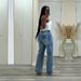 Women's retro washed denim tassel cross hip-hop straight 9-point pants_mkmklike.com