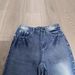 "Men's Vintage Washed Blue Flared Jeans – Parisian-Inspired Dirty Fit | Retro 70s Bell Bottoms | Lost Videotape Wash Effect"_mkmklike.com