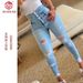 "High Waisted Ripped Skinny Jeans – Butt Lift Stretch Denim, Multi-Button Closure, Light Blue Slim Fit Jeans For Women (Sizes S-2XL)"_mkmklike.com
