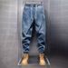 "Men's Distressed Slim-Tapered Jeans Trendy Streetwear, Relaxed Fit With Cuffed Hem, Vintage Washed Denim (Urban Hip-Hop Look)"_mkmklike.com
