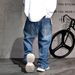 Men's Clothing 2025 Spring New Style Street Heavy Washed Ripped Jeans Men's Design Collection Bright Line Stitching Bag Pants_mkmklike.com