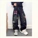 Ruffian Handsome Personality Splashing Ink Graffiti Black Fake Ripped Jeans Men's Trend Micro-chapter Design Wide-leg Trousers_mkmklike.com