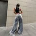 Women's clothing street washed distressed all-match cigarette bell-bottom pants Low-waist wide-leg drape loose slim jeans_mkmklike.com