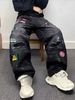 Ruffian Handsome Personality Splashing Ink Graffiti Black Fake Ripped Jeans Men's Trend Micro-chapter Design Wide-leg Trousers_mkmklike.com