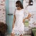 Women'sNew Solid Color Short Sleeve Dress Women's Round Neck Hollow Lace Dress A-Line Dress_mkmklike.com